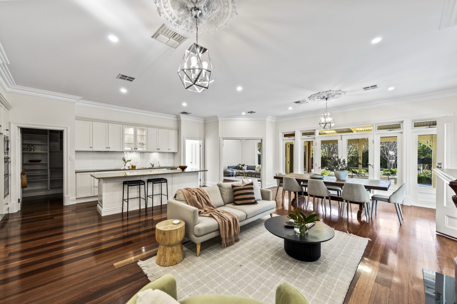 Renovated open-plan kitchen, living and dining area with polished timber floors